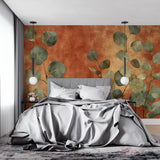 Botanical wallpaper featuring eucalyptus leaves in cozy bedroom setting