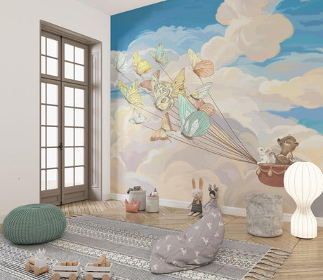 Butterfly woodland wallpaper creating magic in a bright nursery with natural light and simple wooden furniture