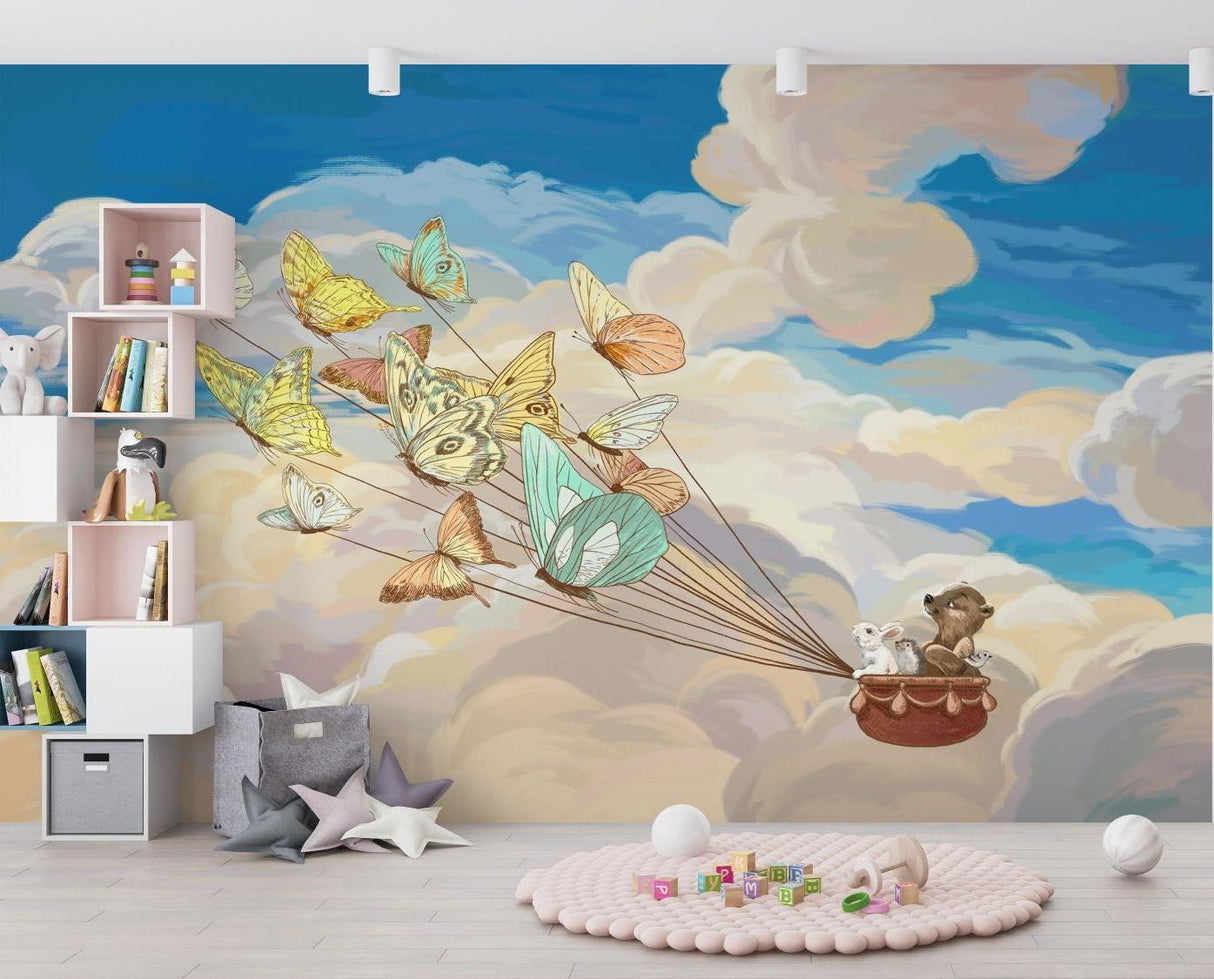 Kids bedroom featuring whimsical butterfly and woodland animal mural with cozy reading nook