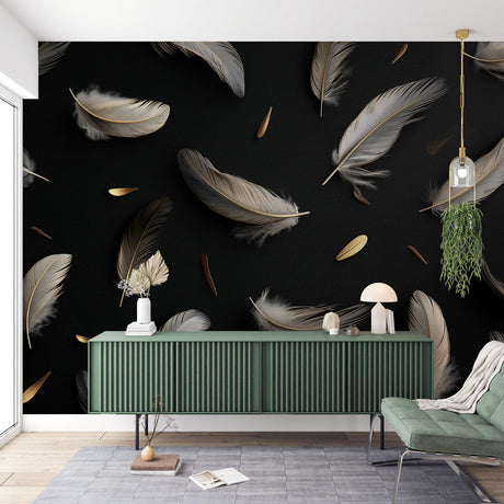 Black and gold feather wallpaper mural creating an elegant atmosphere in a modern living room with tall windows