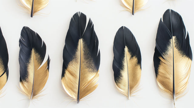 Black and gold feather wallpaper creating a dramatic statement wall in a modern living room with plush furniture