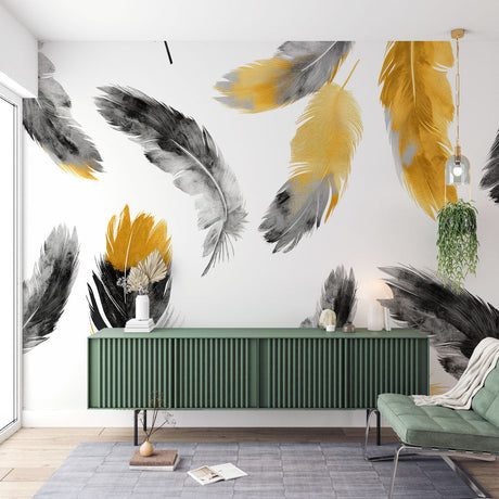 Black and gold feather wallpaper mural creating an elegant statement wall in a modern living room with soft lighting