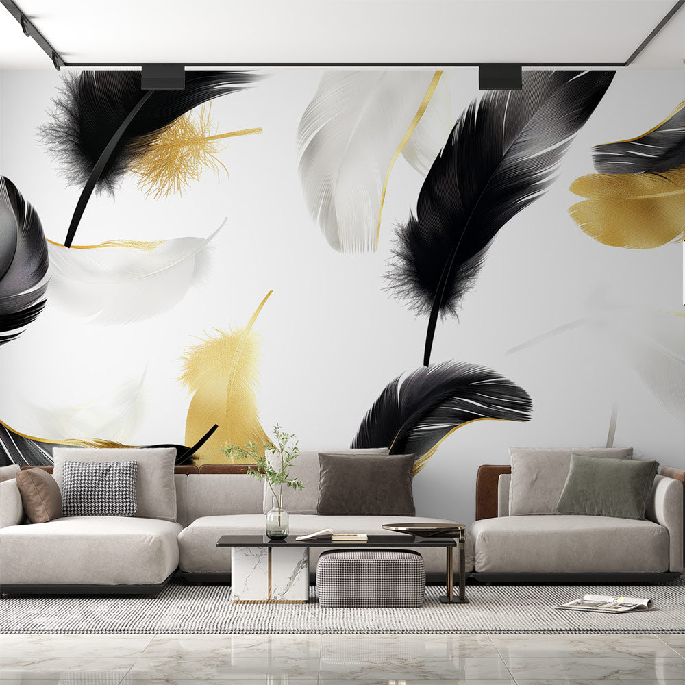Black and gold feather wallpaper mural creating a stunning accent wall in a modern living room with natural lighting