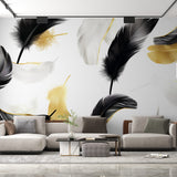 Black and gold feather wallpaper mural creating a stunning accent wall in a modern living room with natural lighting