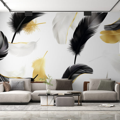 Black and gold feather wallpaper mural creating a stunning accent wall in a modern living room with natural lighting