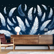 Celestial feather wallpaper creating a peaceful atmosphere in a modern bedroom with soft lighting and minimal furniture