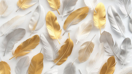 Luxury gold and white feather wallpaper in a bright modern bedroom, creating an elegant accent wall behind a plush bed
