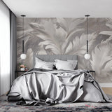 Elegant master bedroom featuring grey and white feather wall mural above a plush bed