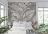 Dining room showcasing grey feather mural wallpaper in natural daylight