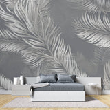 Grey feather wallpaper mural in modern living room with grey sofa and natural light