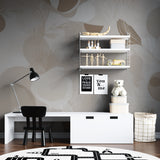 Beige feather pattern wallpaper adding warmth to a modern home office