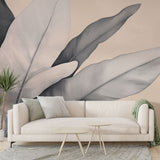 Modern grey and beige Feather Mural Wallpaper creating a peaceful atmosphere in a minimalist living room setting