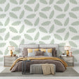 Sage green feather wallpaper creating a serene atmosphere in a modern living room with natural light