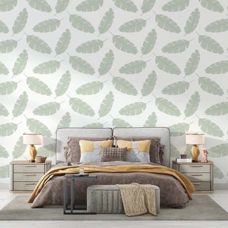Sage green feather wallpaper creating a serene atmosphere in a modern living room with natural light