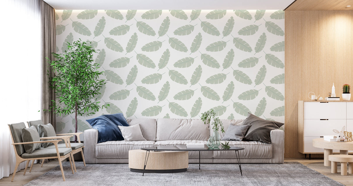 Sage green palm pattern wallpaper in a minimalist home office setting