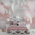 Pink feather wallpaper creating a soft, dreamy atmosphere in a modern bedroom with minimal furniture