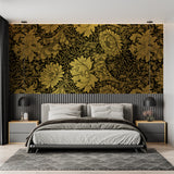 Black and gold floral wallpaper bringing luxury to a home office space