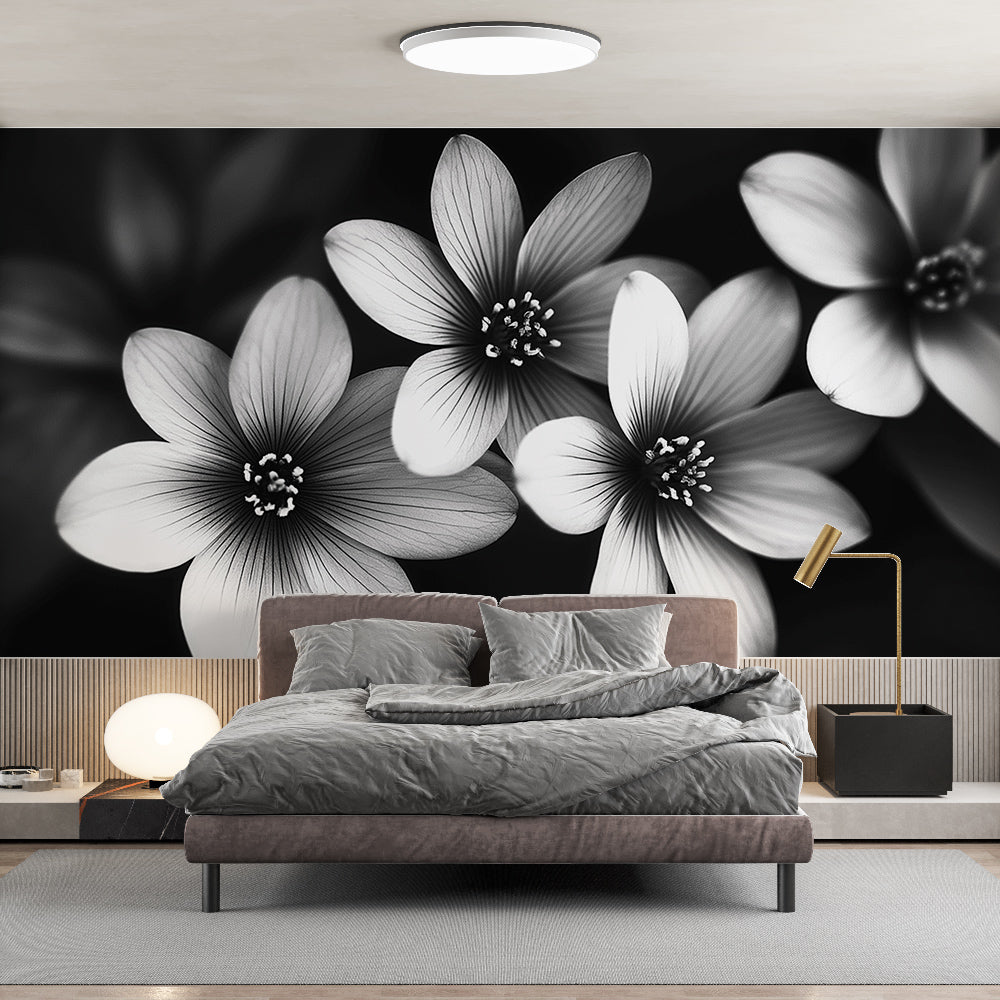 Black and white floral wallpaper creating dramatic impact in modern living room with minimalist furniture