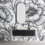 Black and white botanical line art mural wallpaper styled in a modern dining room with minimal furniture