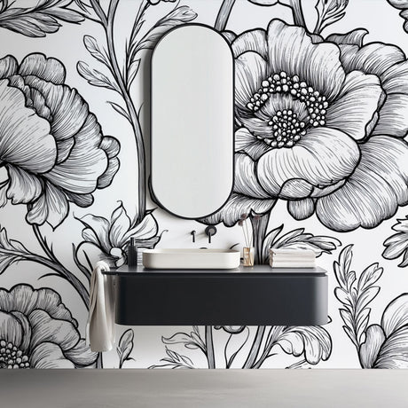 Black and white botanical line art mural wallpaper styled in a modern dining room with minimal furniture