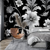 Dramatic botanical wall mural in master bedroom with soft lighting