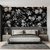 Black floral pattern wallpaper creating stunning accent wall in master bedroom