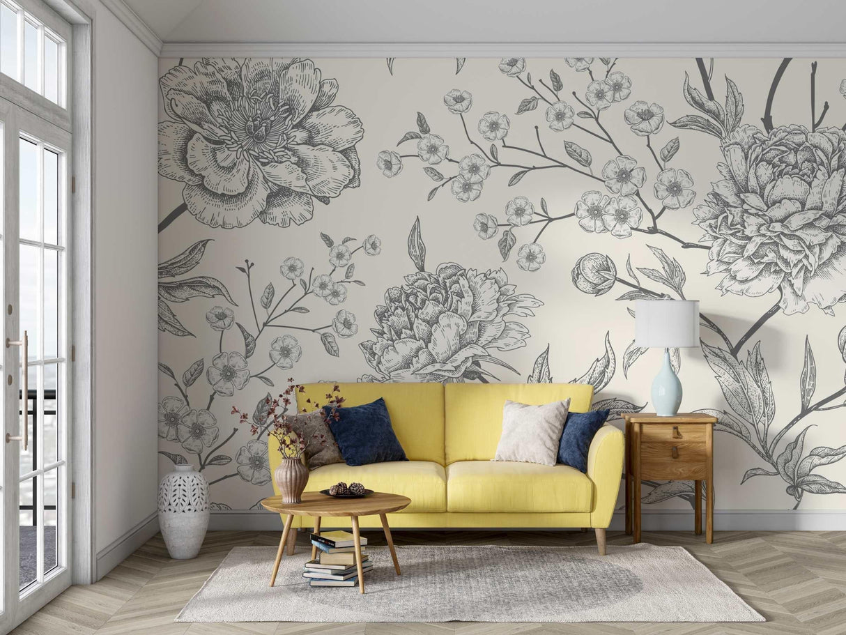 Black and white botanical sketch wallpaper in modern living room showing delicate floral pattern against light walls