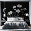 Black and white floral wallpaper with cosmos flowers adding elegance to a modern living room with clean lines