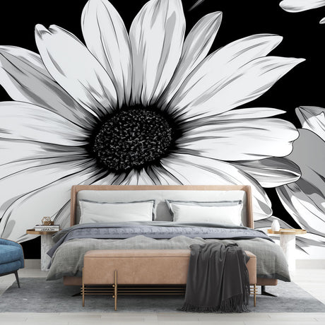 Black and white daisy wallpaper mural in modern living room setting, creating dramatic contrast against neutral furniture