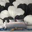 Black and white Ginkgo wallpaper creating drama in a modern dining room, large-scale botanical pattern adds sophistication
