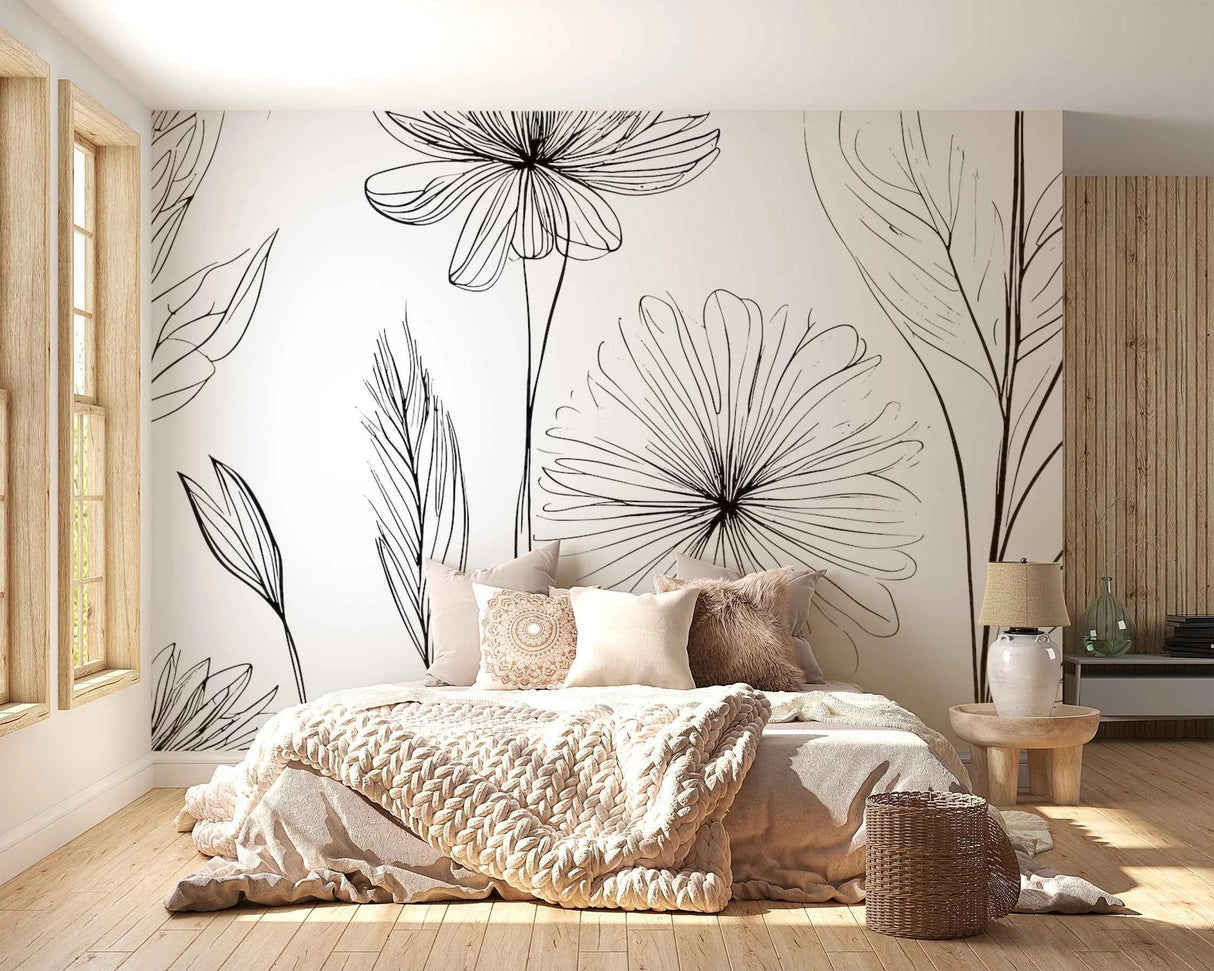 Black and white floral line art wallpaper creating a stunning focal point in a modern living room with minimal furniture