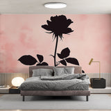 Black Rose Silhouette Wallpaper creating a stunning accent wall in a modern bedroom with pink and gray decor