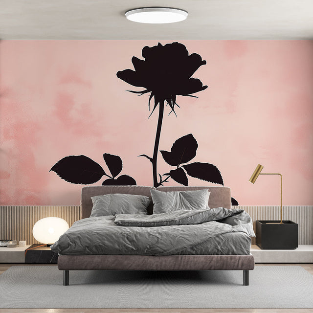 Black Rose Silhouette Wallpaper creating a stunning accent wall in a modern bedroom with pink and gray decor