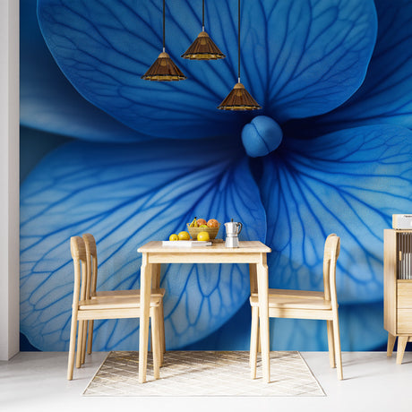 Blue and gold abstract floral wallpaper creating a peaceful atmosphere in a modern living room with minimal furniture
