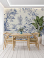 Blue toile de jouy wallpaper in elegant dining room with classic furniture and natural light