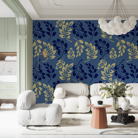 Blue and gold leaf pattern wallpaper in modern living room with gray sofa and natural light