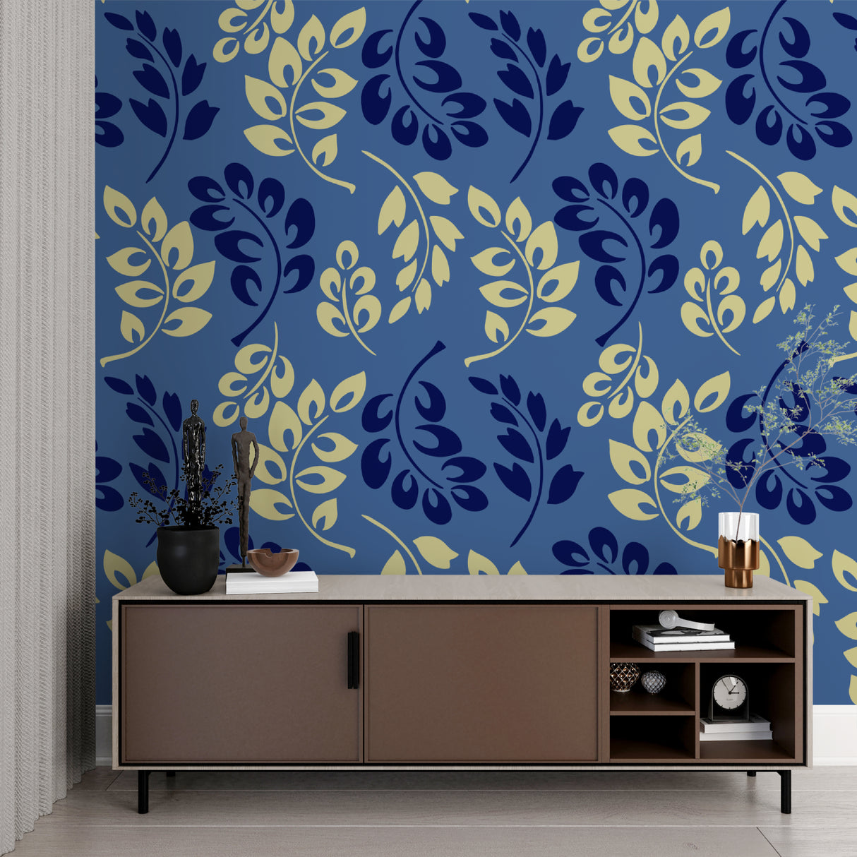Blue and gold botanical wallpaper in home office with wooden desk