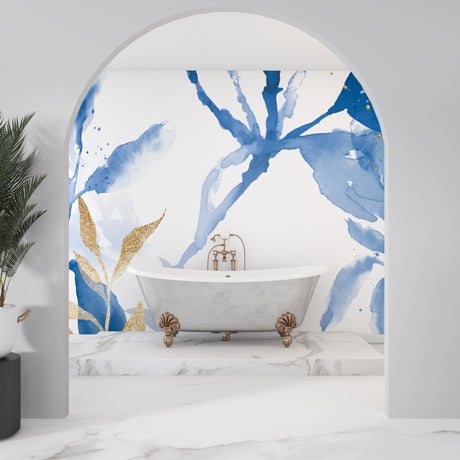 Blue and gold watercolor floral wallpaper in modern living room creates serene atmosphere