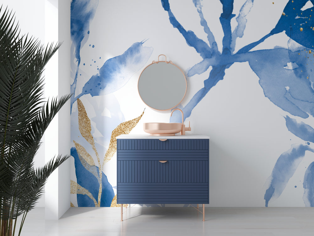 Elegant bathroom featuring blue floral wallpaper with gold accents