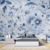 Botanical wall mural transforming entrance hall with soft blue floral pattern
