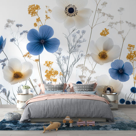 Blue and white floral wallpaper with gold accents creating an elegant atmosphere in a bright modern living room