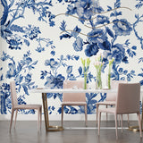 Master bedroom with blue chinoiserie pattern wallpaper creating peaceful atmosphere