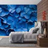 Blue Hydrangea Wallpaper creating a peaceful atmosphere in a bright modern living room with white furniture