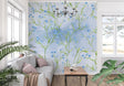 Blue Liberty floral wallpaper in bright modern living room creating fresh garden atmosphere