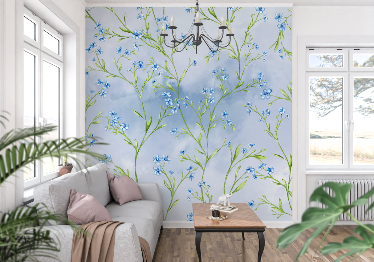 Blue Liberty floral wallpaper in bright modern living room creating fresh garden atmosphere