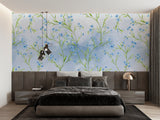 Botanical wall mural in home office showing delicate blue flower pattern