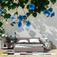 Blue Morning Glory floral wallpaper creating a fresh garden feel in a bright modern bedroom with natural light