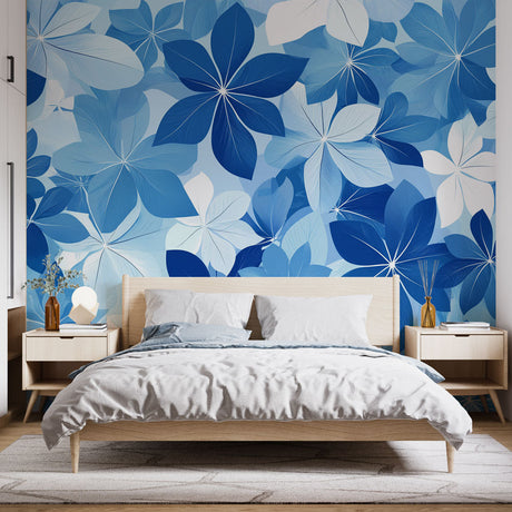 Blue floral wallpaper mural creating a serene atmosphere in a modern living room with natural light
