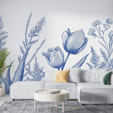 Blue tulip and fern wallpaper creating a fresh botanical atmosphere in a bright modern dining room
