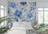 Blue botanical wallpaper bringing fresh garden vibes to a home office space